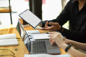 A business management team is planning their development activities