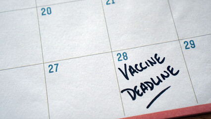 Vaccine deadline written on a calendar