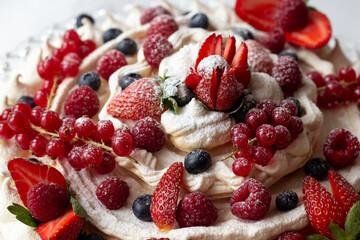 Pavlova cake with fresh berries