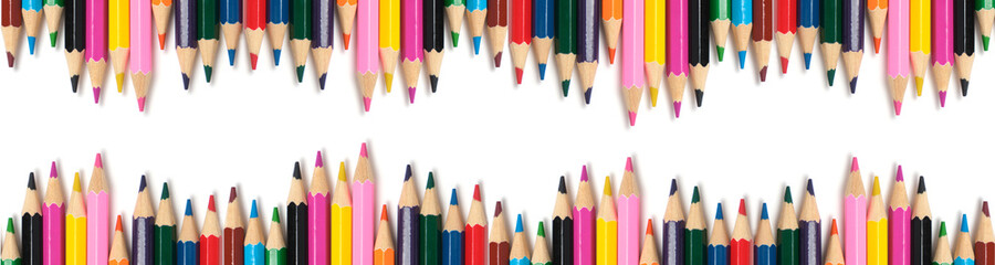 Banner,bright colored pencils on a white background.School supplies for drawing.