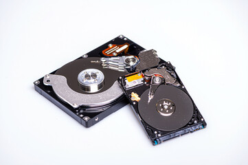 Close up inside of computer hard disk drive HDD isolated on white background