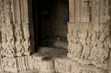 Carved wall outside the sanctum of the Baleshwar temple, one of the five rock temples inside...