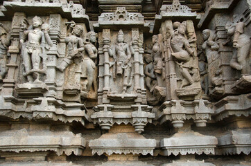 Sculptures carved on the outer wall of the Laxminarayana temple one of the five rock temples inside Bahadurgad, Pedgaon, Taluka Shrigonda, Maharashtra, India