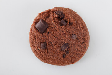 chocolate chips cookie isolated on white background, top view.