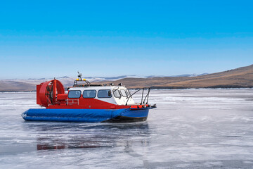 Hovercraft - Khivus on Lake Baikal. Khivus, airboat, winter transport extreme. Hovercraft sliding...