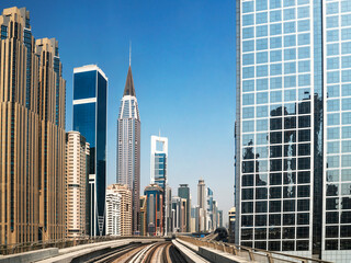 Fototapeta na wymiar Financial center with skyscrapers and subway rails.