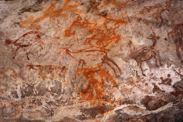 Obraz na płótnie Canvas Bhimbetka Rock Shelters, Raisen, Madhya Pradesh, India. Declared a UNESCO World Heritage site in 2003, the shelters contain ancient rock art from the Upper Paleolithic to Medieval times.
