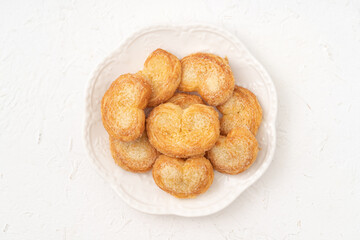 Delicious Palmier butterfly pastry in heart shape for Valentine's day dessert.