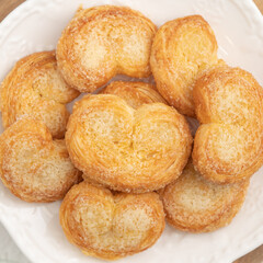 Delicious Palmier butterfly pastry in heart shape for Valentine's day dessert.