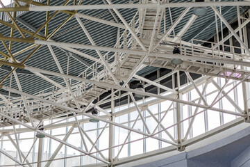 Metal tubes construction in big building, industrial architecture