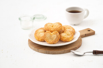 Delicious Palmier butterfly pastry in heart shape for Valentine's day dessert.