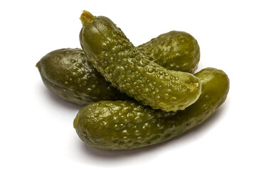 Tasty canned Whole green cornichons isolated on a white background