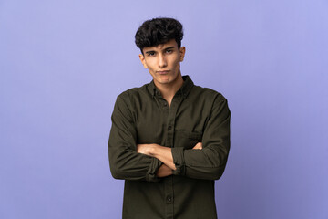 Young Argentinian man isolated on background feeling upset