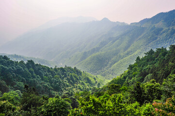 Fototapeta premium Rocks, streams, waterfalls and cable cars on misty mountains, Lushan, China.