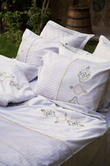 Bedroom bed with pillows and bed sheets