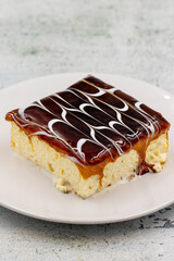 Caramel trilece dessert on stone background. Traditional Turkish cuisine flavor. close up