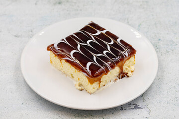 Caramel trilece dessert on stone background. Traditional Turkish cuisine flavor. close up