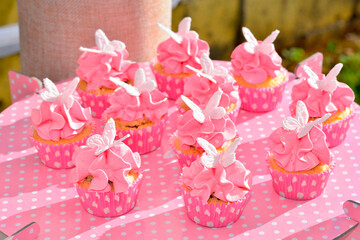 Sweet Candy bar shaped muffins filled with chocolate and strawberry and white fondant butterflies