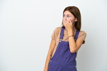 Young English woman isolated on white background doing surprise gesture while looking to the side
