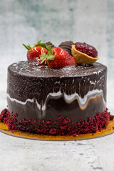 Celebratory chocolate cake on a stone background. Pastry products. close up