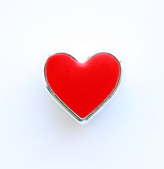 Red heart isolated on white background. Top view, flat lay.