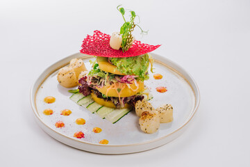 Salad with Australian scallops on a white background