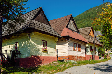 Fototapeta na wymiar Street with traditional wooden houses in the village of Vlkolinec, Slovakia, Europe. Vlkolinec is included in the UNESCO World Heritage List.