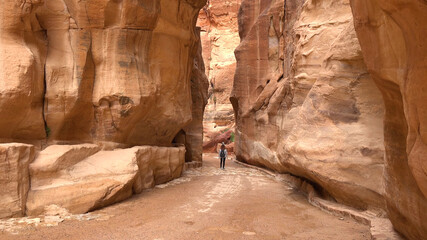 Tourist route through the gorge to Petra - Nabataean rock temple. Jordan