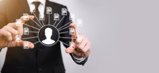 Document Management System DMS .Businessman hold user and document icon.Software for archiving, searching and managing corporate files and information.Internet Technology Concept.Digital security.
