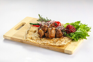 Pork meat shashlik served salad
