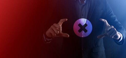 Hand holds icon,cancellation symbol,cancel icon.Cross mark flat red icon.round X mark.cancel...