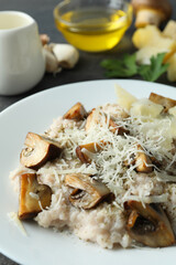 Concept of tasty food with risotto with mushrooms, close up