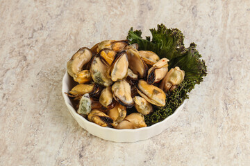 Tasty marinated mussels in the bowl
