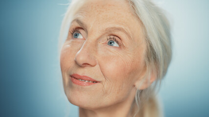 Close-up Portrait of Beautiful Senior Woman Looking Away Wonderfully. Gorgeous Looking Elderly...