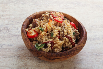 Arabic cous cous with meat and tomato