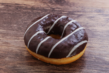 Glazed sweet tasty chocolate donut