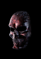 Human skull in blood isolated on black background with clipping path