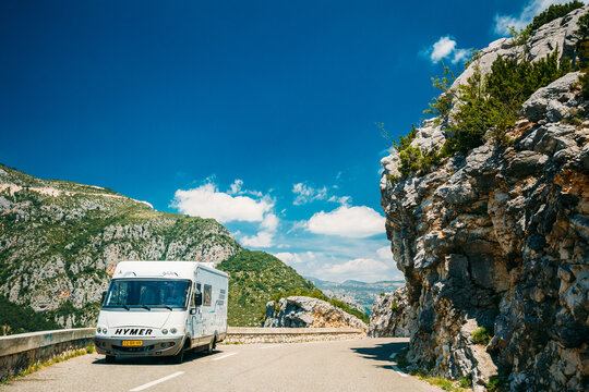 White colour Hymer motorhome car on background of French mountain nature landscape