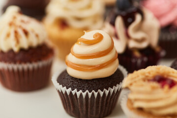 Small chocolate cupcake with caramel cream