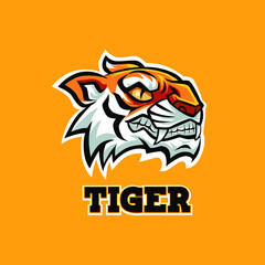 Tiger Mascot Logo With Cartoon Style Illustration Yellow Orange Color This logo is very suitable for teams, communities, groups, sports, basketball, soccer, rugby, and also for clothes, t-shirts, jack