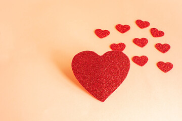 valentine's day background.Big red heart and small red hearts behind it.