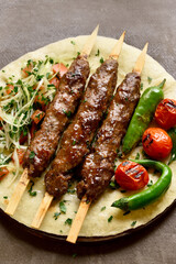 Turkish Adana Kebab with fresh vegetables