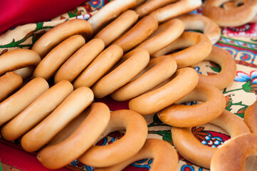 fresh pastries lie in rows on the table to