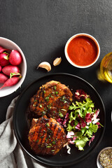 Roasted pork steak with vegetable salad
