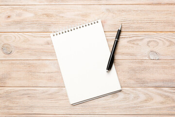 Blank notebook with pen on white background. Back to school and education concept