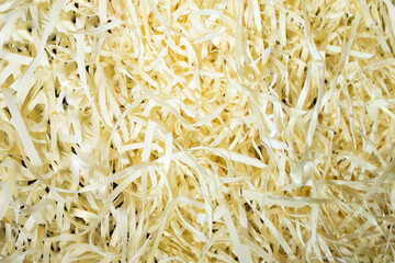 A bunch of large sawdust and shavings. Abstract textured background for wallpaper in the form of a pattern.
