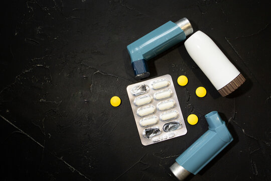 Medical Equipment And Drugs For The Treatment Of Bronchial Asthma. Nebulizer, Medical Inhaler, On A Black Background