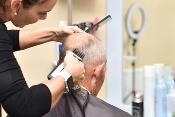 barber cutting hair