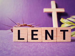 Lent Season,Holy Week and Good Friday concepts - word lent on wooden blocks in purple vintage...