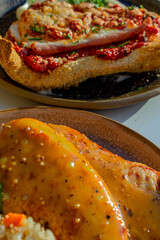 grilled chicken with gourmet sauce and Milanese Parmesan